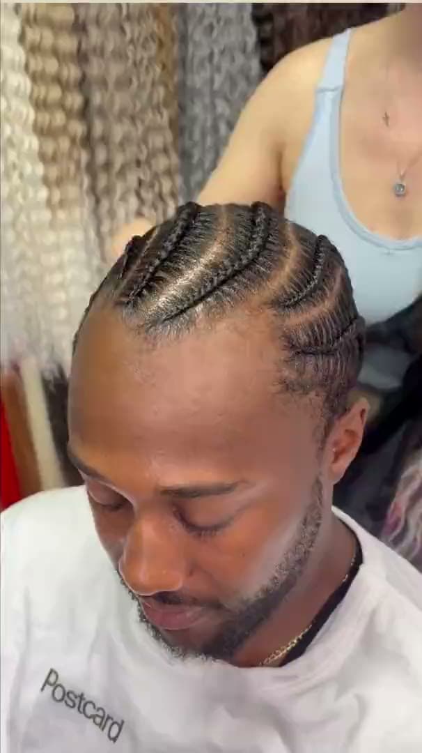 Cornrows braided straight back in close, even rows
